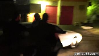 Police amuse themselves with the arrested