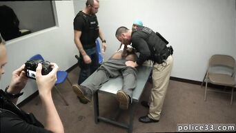 Police amuse themselves with the arrested