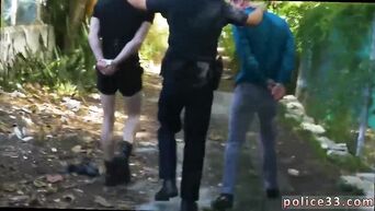 Two cops made the gay make them a blowjob at the police station