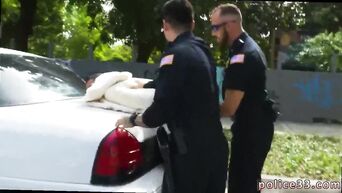 Two cops made the gay make them a blowjob at the police station