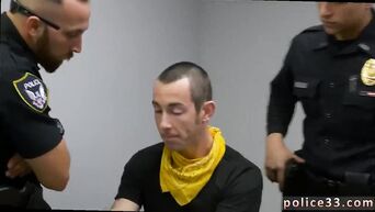 Two cops made the gay make them a blowjob at the police station