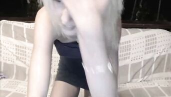 Depraved blonde in a black dress