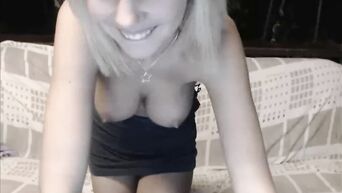 Depraved blonde in a black dress