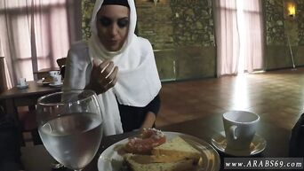 Sexy affection with an Arab in a restaurant
