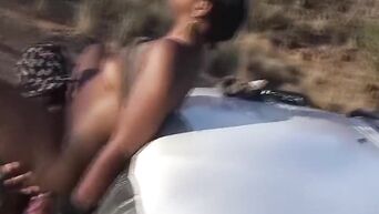 Strong nigger fucks a succulent black whore in the desert