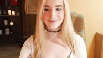 Young elastic tits of a seductive blonde