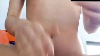 A girl with natural tits masturbates to a webcam for her boyfriend