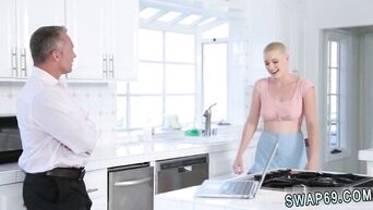 Short-haired bitch engaged in oral sex with girlfriend's daddy