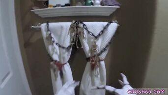 The girl hides the face under the mask and sucks Daddy's dick