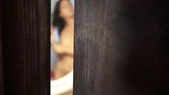 Young brunette after shower doing blowjob