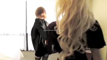 Lesbians in stockings fuck with strapon