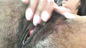 Black woman masturbates hairy cunt and ass in car