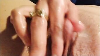 Nymph pulls huge clit to orgasm
