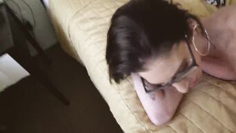 Spectacled nympho with fake breasts