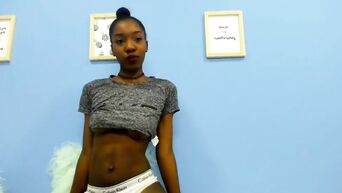 African girl squeezes breast milk from her nipples