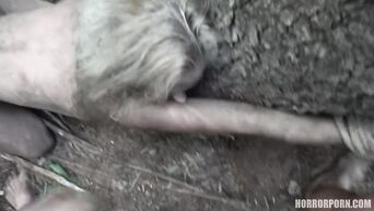 Horror xxx: Maniac with chainsaw fucks bound captives in forest