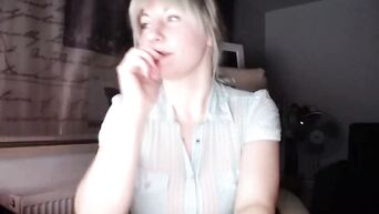 Blonde with gigantic tits posing to the webcam
