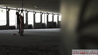 HD Porn: A sex maniac fucks a tied blonde in a parking lot