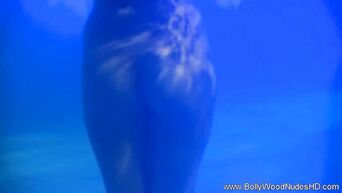 Indian girl shows an erotic show in the water for romantic music