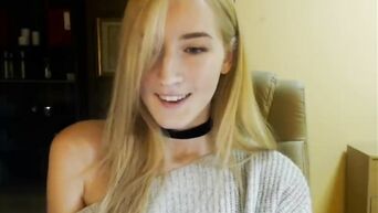 Blonde hot masturbates on the armchair