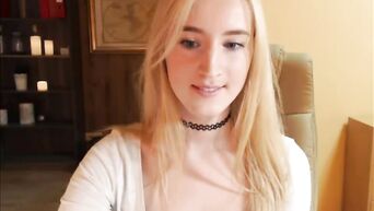 Blonde fucks herself with her finger