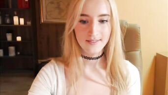 Blonde fucks herself with her finger