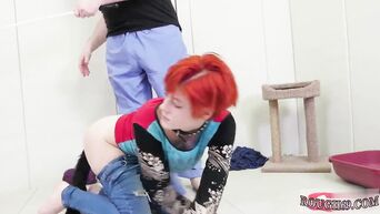 Red-haired slave crawls on floor like dog, trying to satisfy two partners