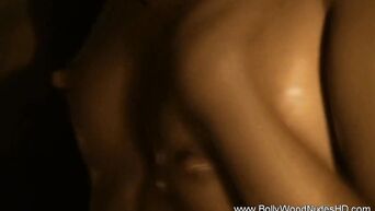 Relaxing while smoking hookah, Indian babe caresses ideal body