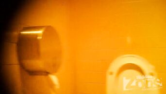 MILF pisses in toilet, not knowing about spy cam
