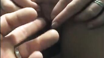 A passionate brunette sucks cock on her knees