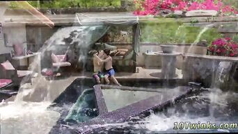 Gay affection of young guys in the pool