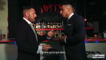 Homosexuals are engaged in oral and anal sex in bar