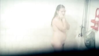 Spy camera in public female shower