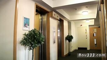 Two young managers are engaged in homosexual sex in the office