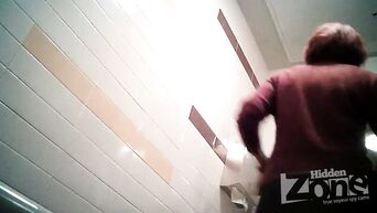 Red-haired MILF pissed and wiped hairy vagina in front of spycam