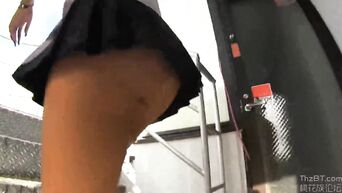 Depraved Asian schoolgirls show ass and pussy in public