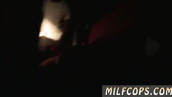 Two MILFs in police uniform bent negro to cunnilingus
