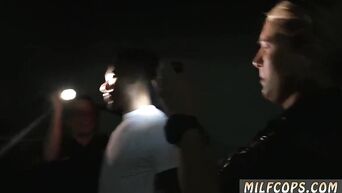 Two MILFs in police uniform bent negro to cunnilingus