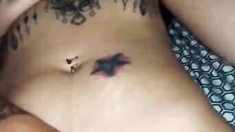 Amateur porn: Tattooed Korean MILF with big tits masturbates