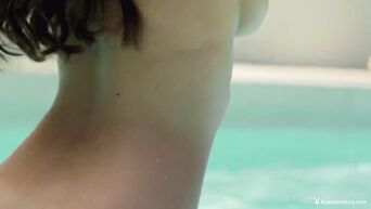 Stunning big wet tits in pool
