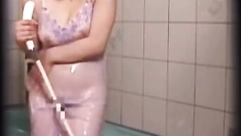 Asian spycam: Japanese MILF masturbates in shower