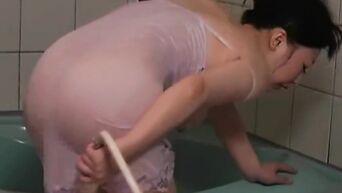 Asian spycam: Japanese MILF masturbates in shower
