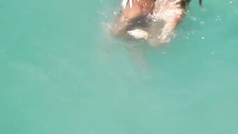 Beach sex of amateur mature couple - public spycam