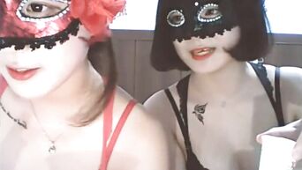 Double webcam solo from Asian stoned girls