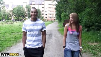 Negro fucks young Russian girl in nature