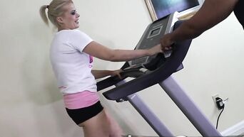Fake tits MILF Nadia White sucks little black dick in gym