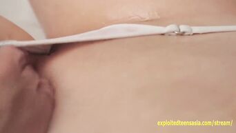 Japanese angel sucks lollipop and enjoys erotic massage