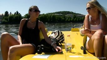 Blonde and brunette want to pee into water