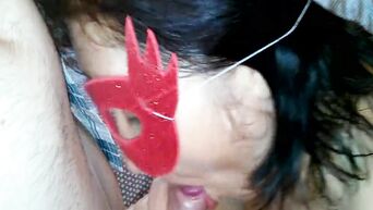 Mature lady in a mask fucks with young lover